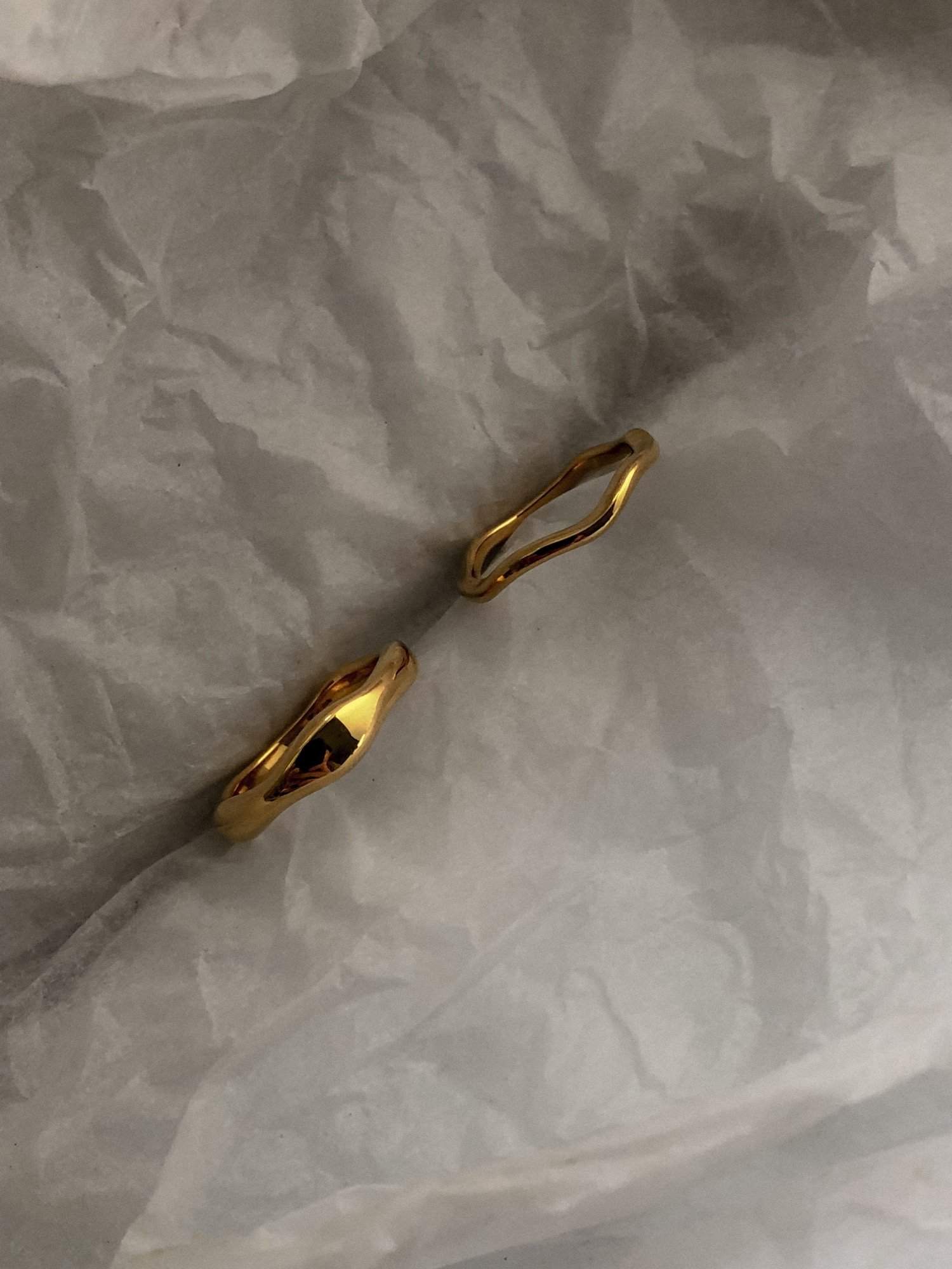 Architectural grade stainless steel ring with premium 18k gold plating.