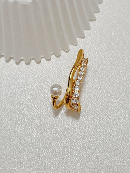 Intricate front view of the delicate Cassidy Pearl and Crystal Gold Cuff Earring, illustrating its comfortable, non-pierced design and glamorous multi-layered aesthetic.