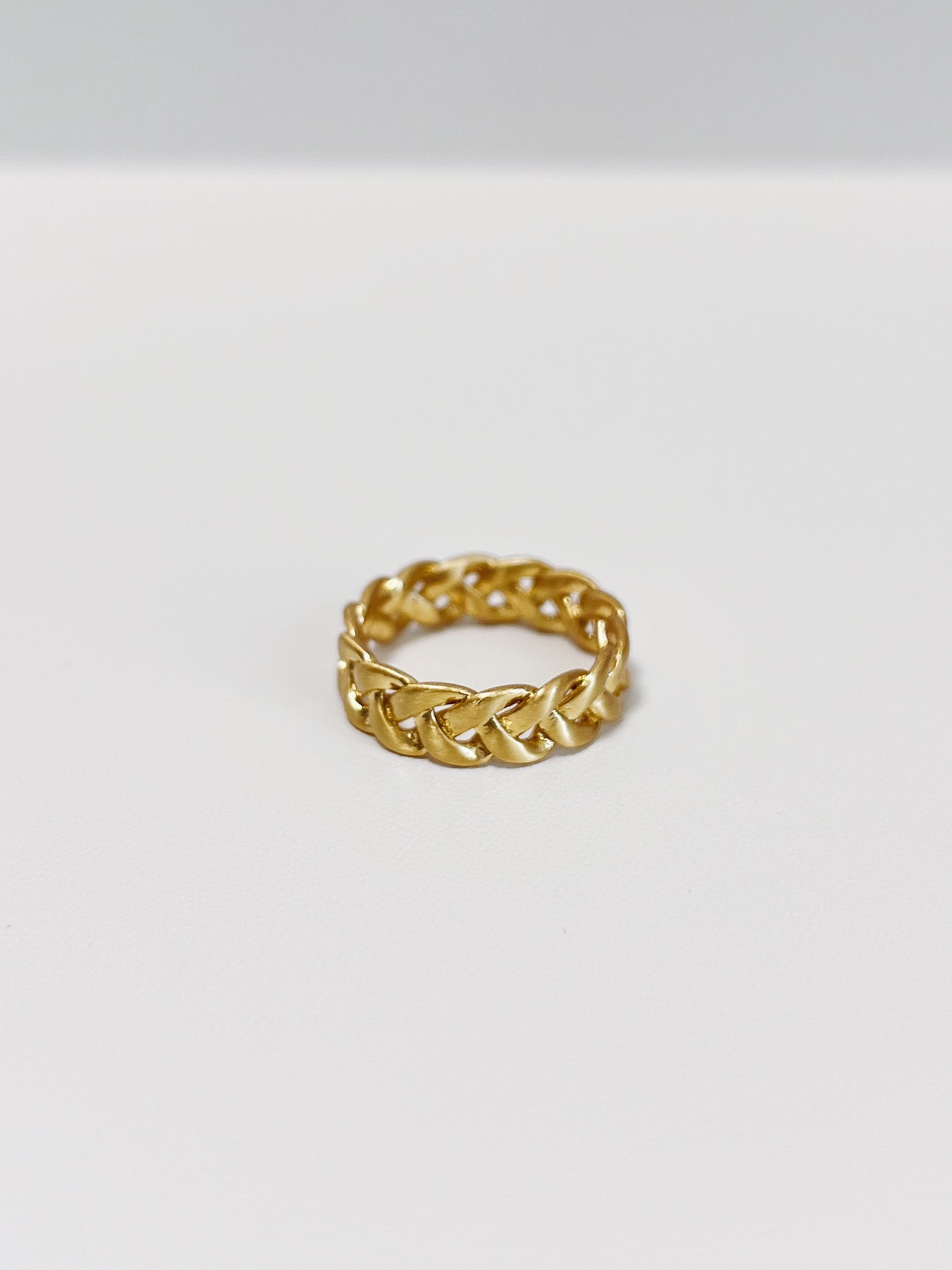 The 6mm statement braided band showing its low-glare brushed texture.
