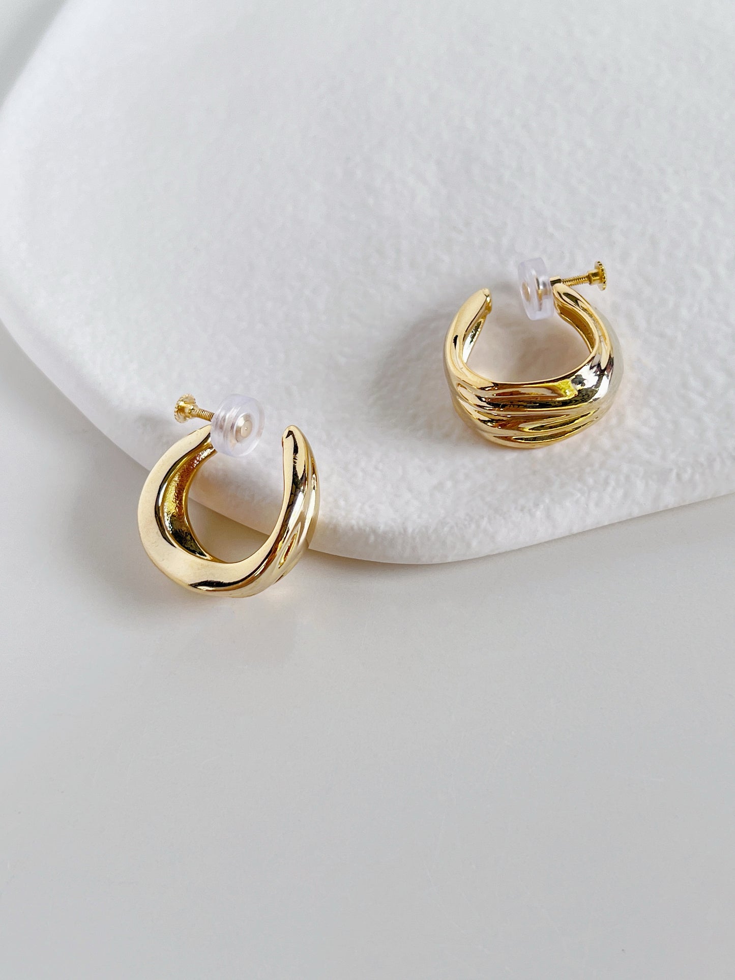 Pair of gold plated Ivette tiered molten clip-on hoop earrings