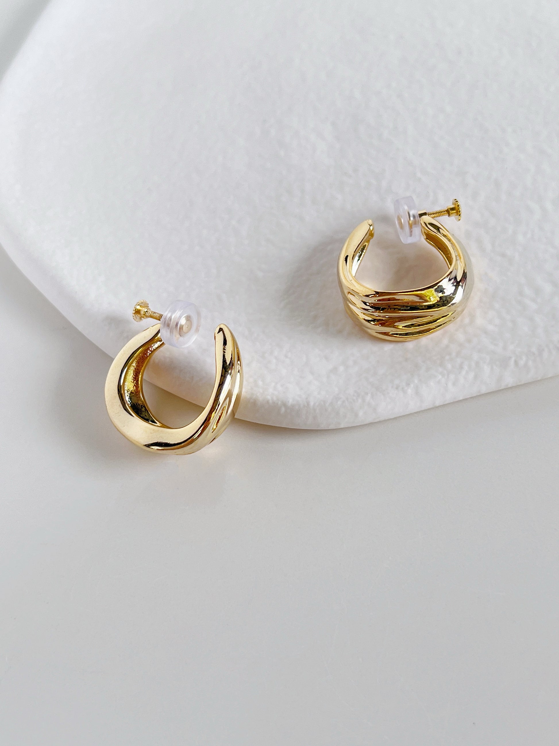 Pair of gold plated Ivette tiered molten clip-on hoop earrings