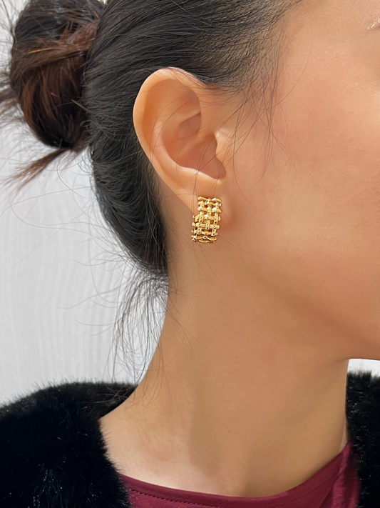 Ear styling with Mylie woven gold hoops.