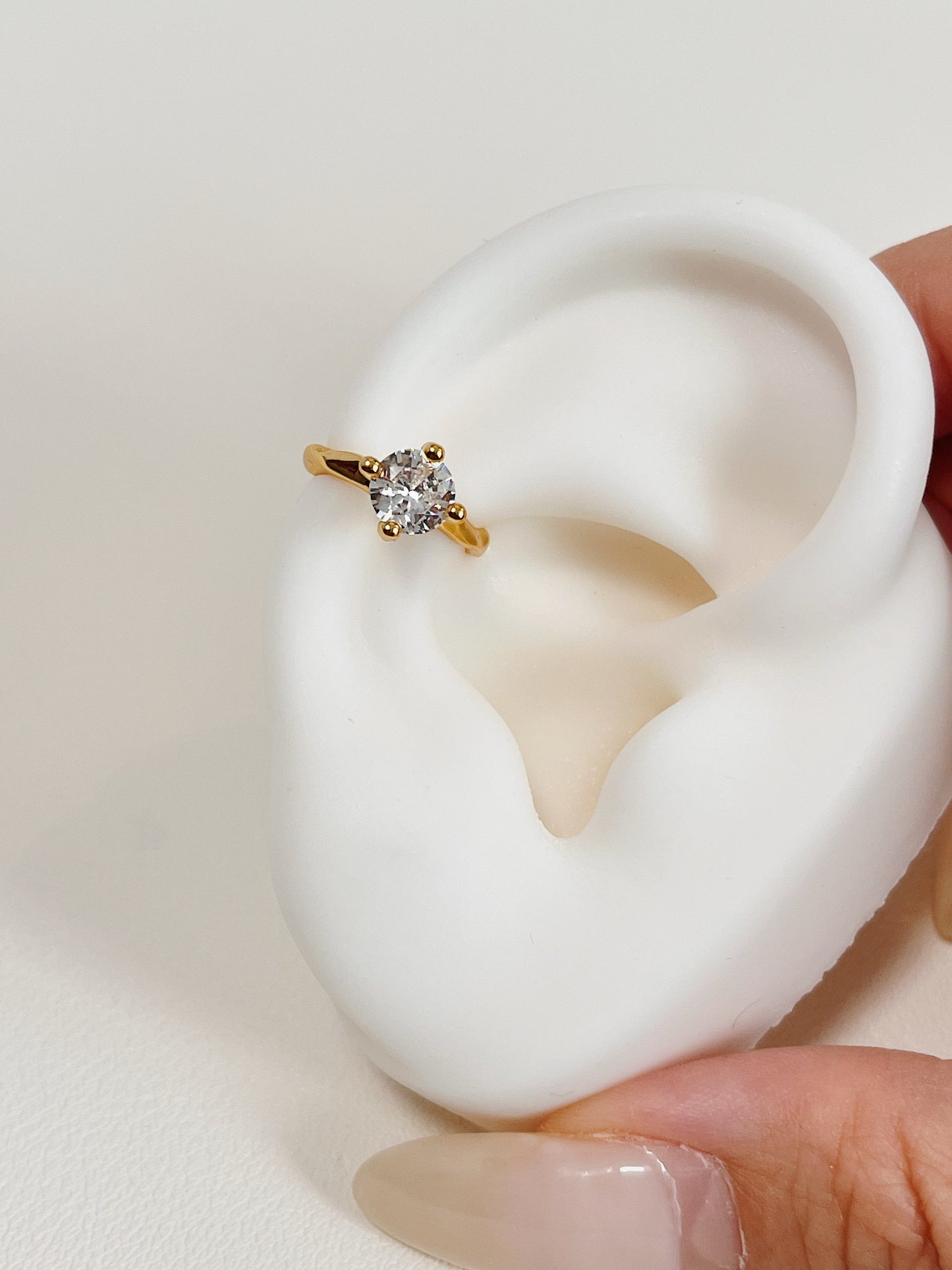 Ear inspiration featuring minimalist solitaire cuff.