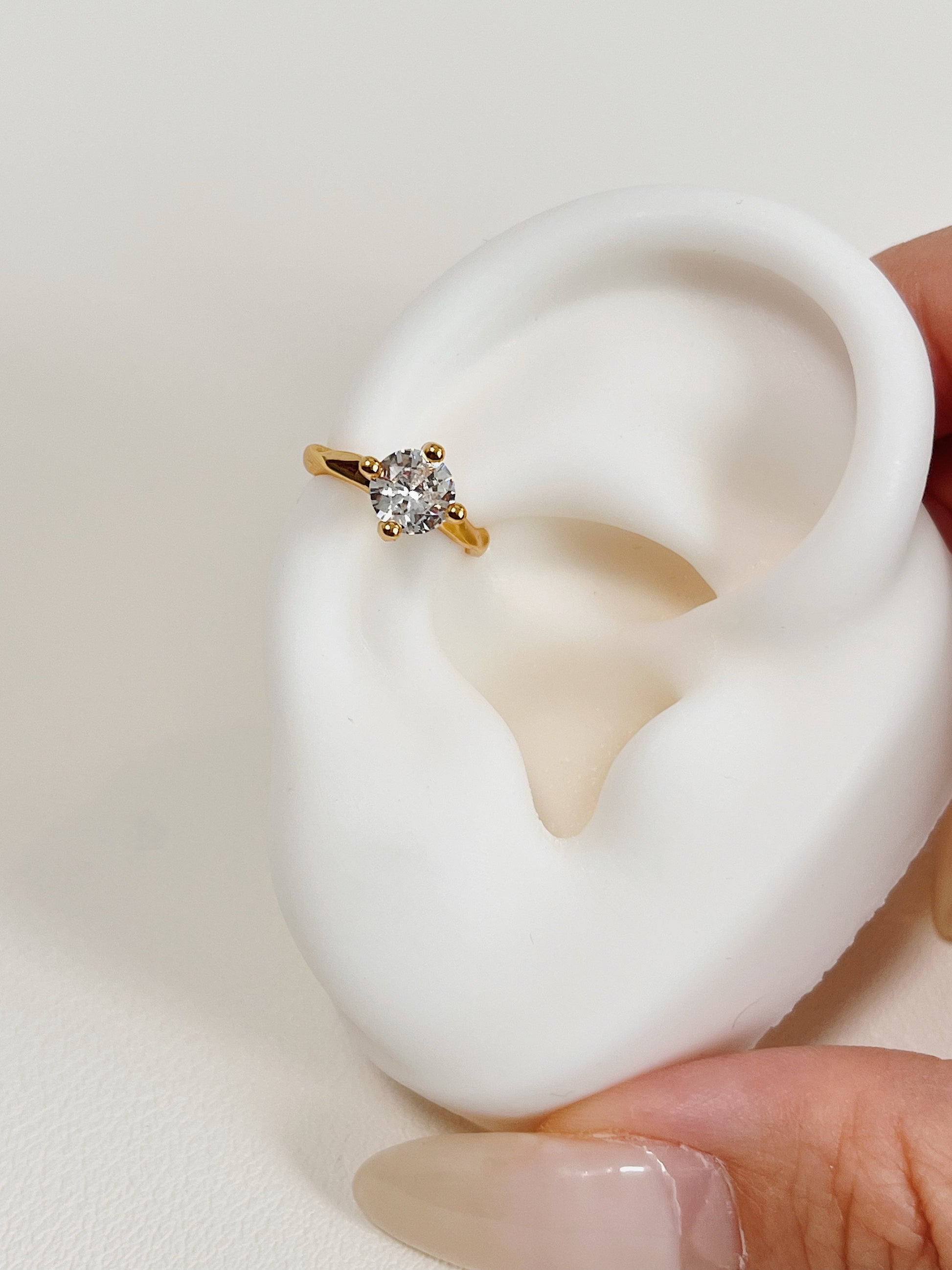 Ear inspiration featuring minimalist solitaire cuff.