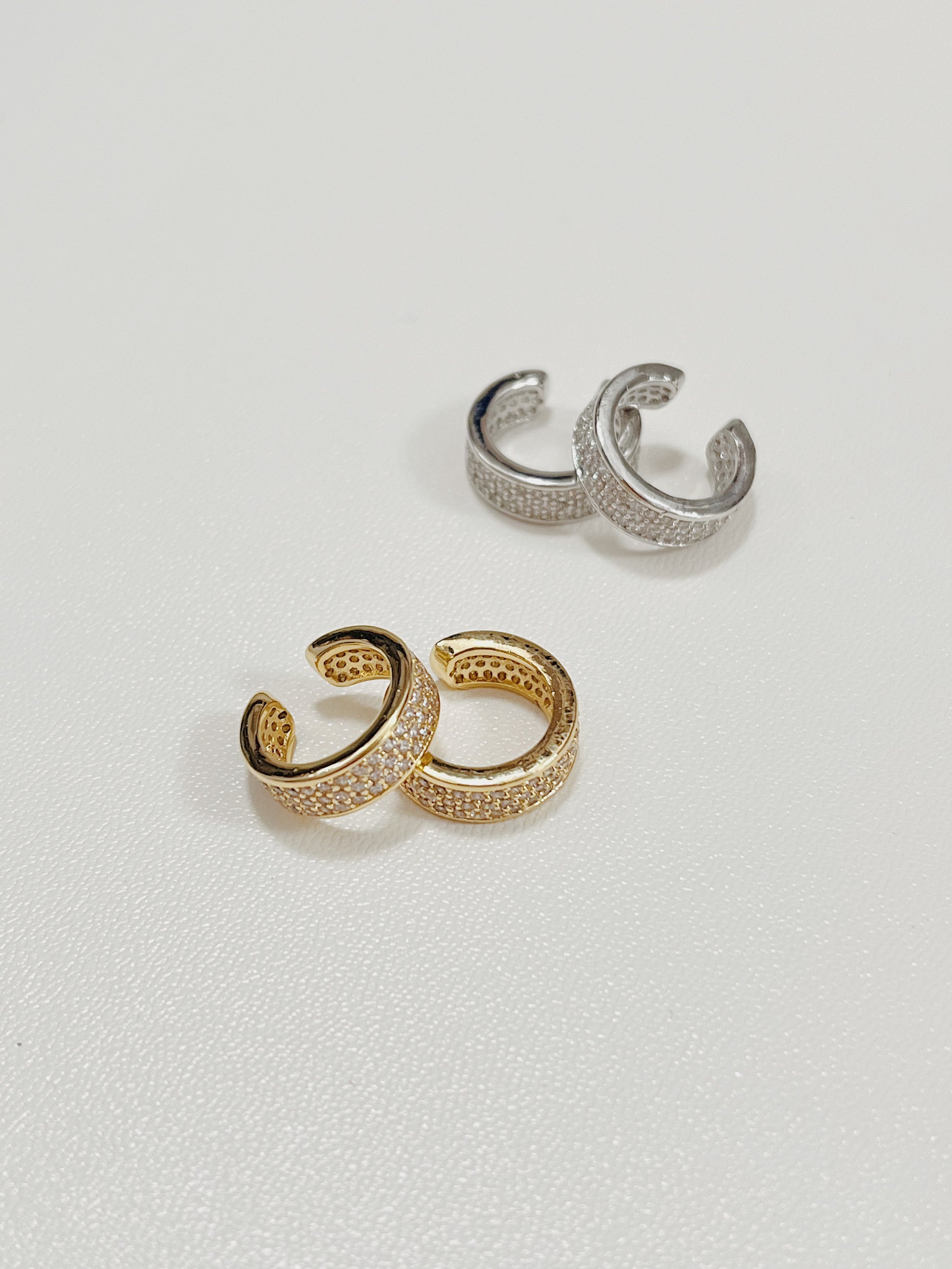 Priscilla Thick Pave Ear Cuff in 14K Gold and rhodium plated on white background.