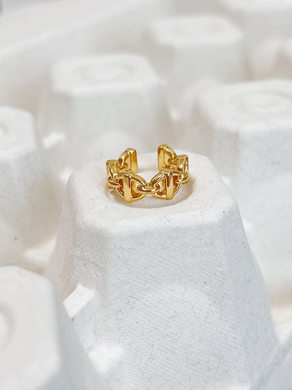 Detailed view of the PVD gold finish on the interior of the Windsor brass ear cuff.