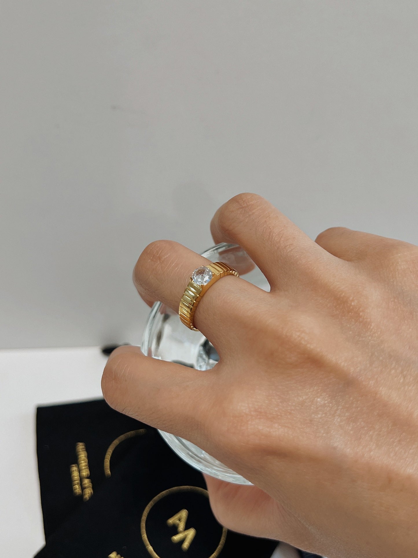 Hand stack featuring the slim ribbed Kass ring