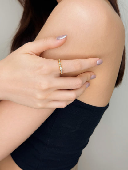 Model wearing Nura beaded eternity ring on casual tank top outfit