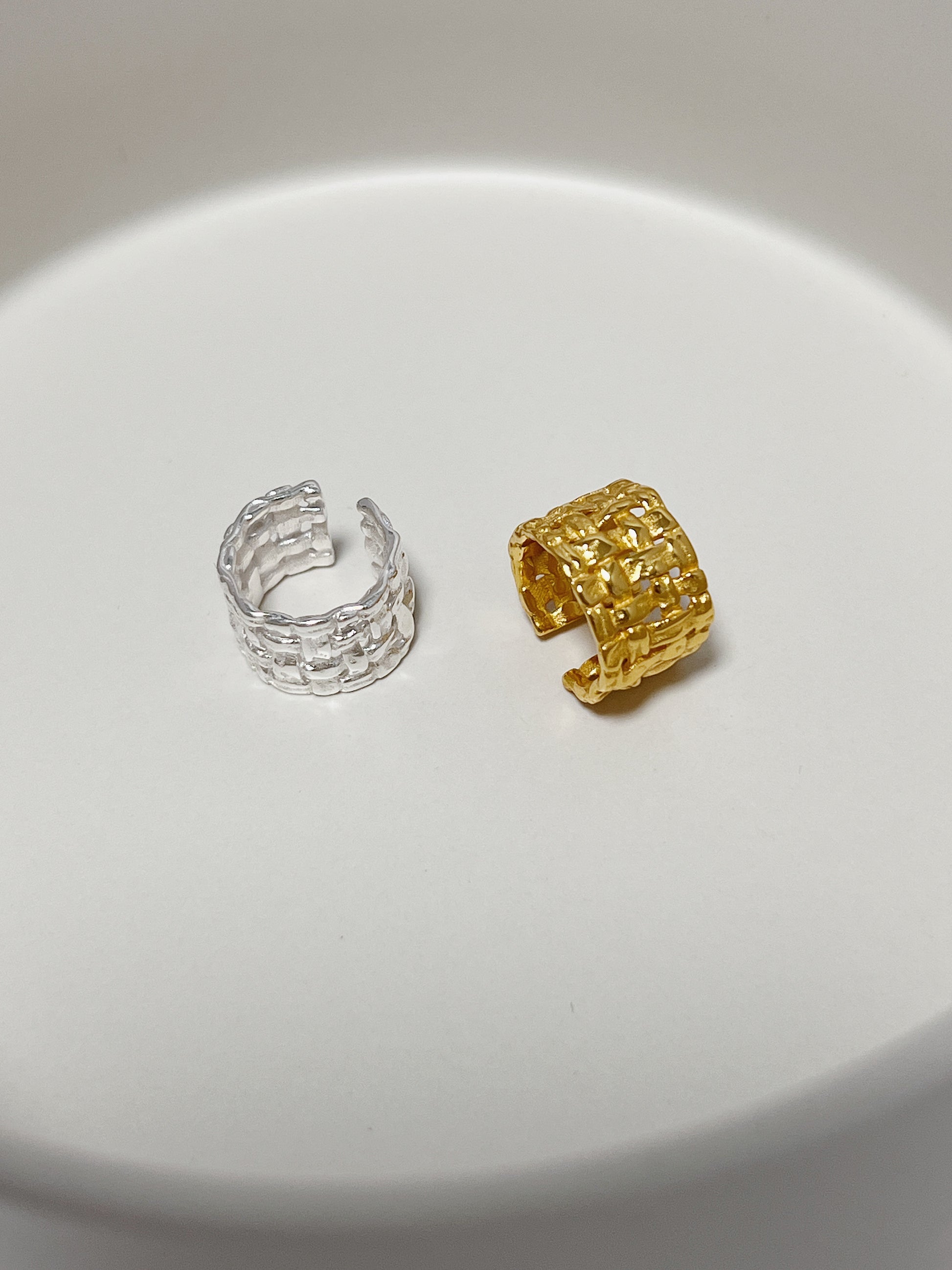 Side-by-side comparison of gold vermeil and sterling silver Carmela cuffs for textural depth.