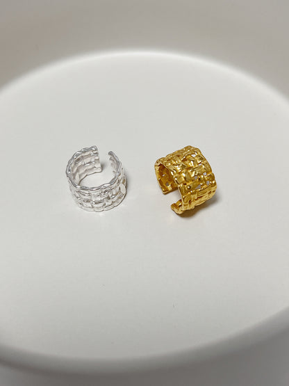 Side-by-side comparison of gold vermeil and sterling silver Carmela cuffs for textural depth.