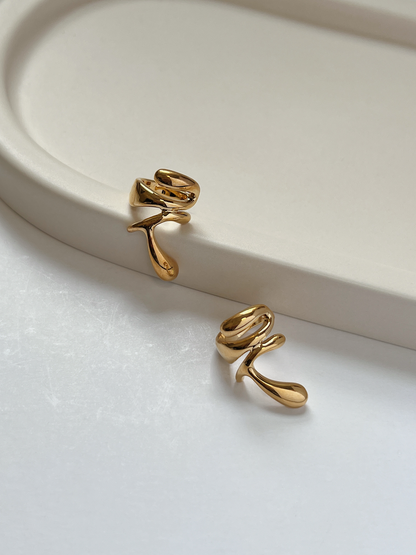 [Aurous Atelier] Dylan abstract gold ear cuff with a molten liquid metal texture.