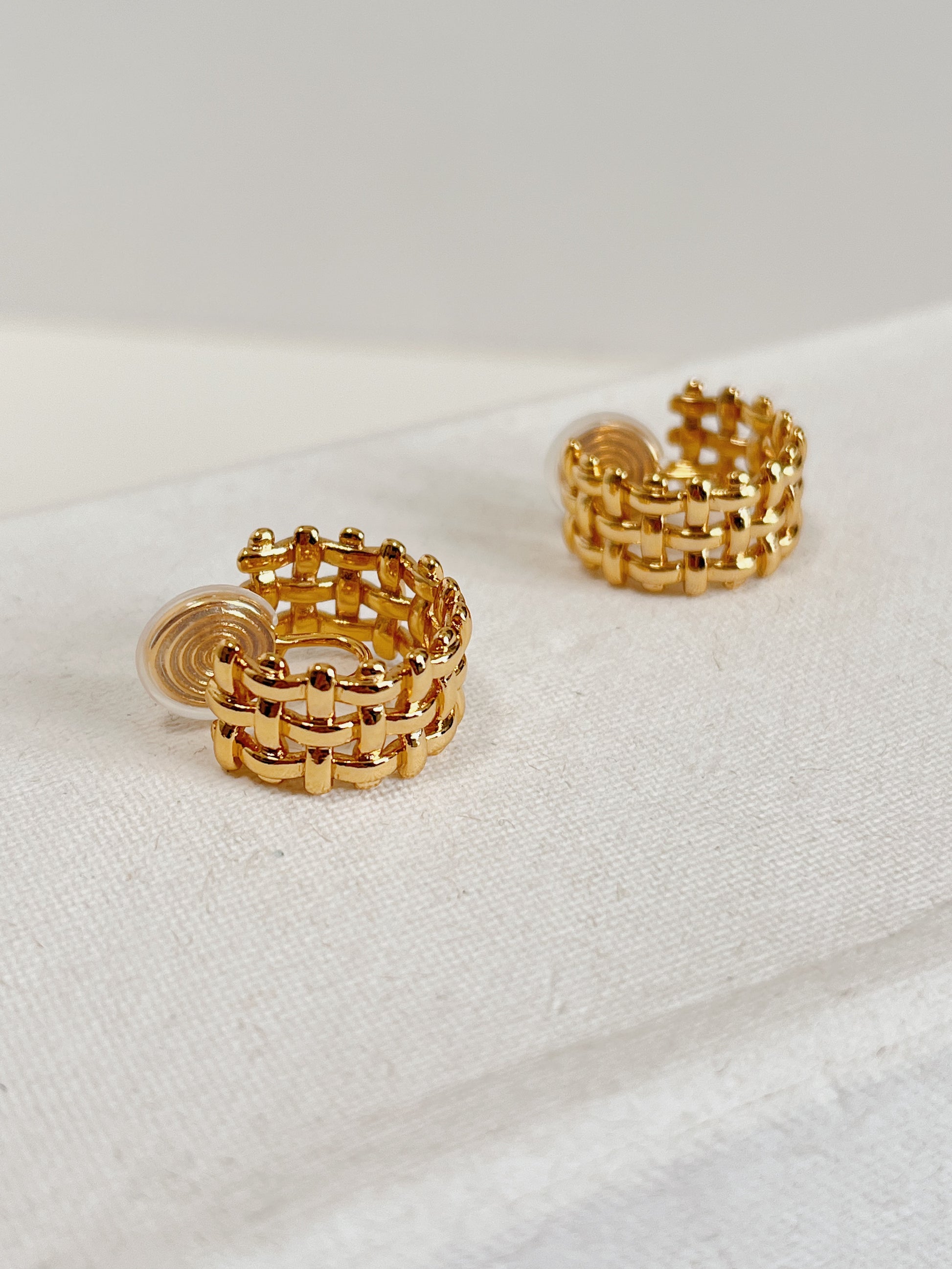 Side profile of Mylie architectural gold hoop.
