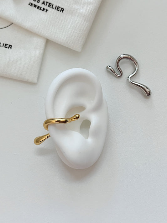 [Aurous Atelier] Tia abstract sculptural ear cuff in 18K gold and industrial silver.