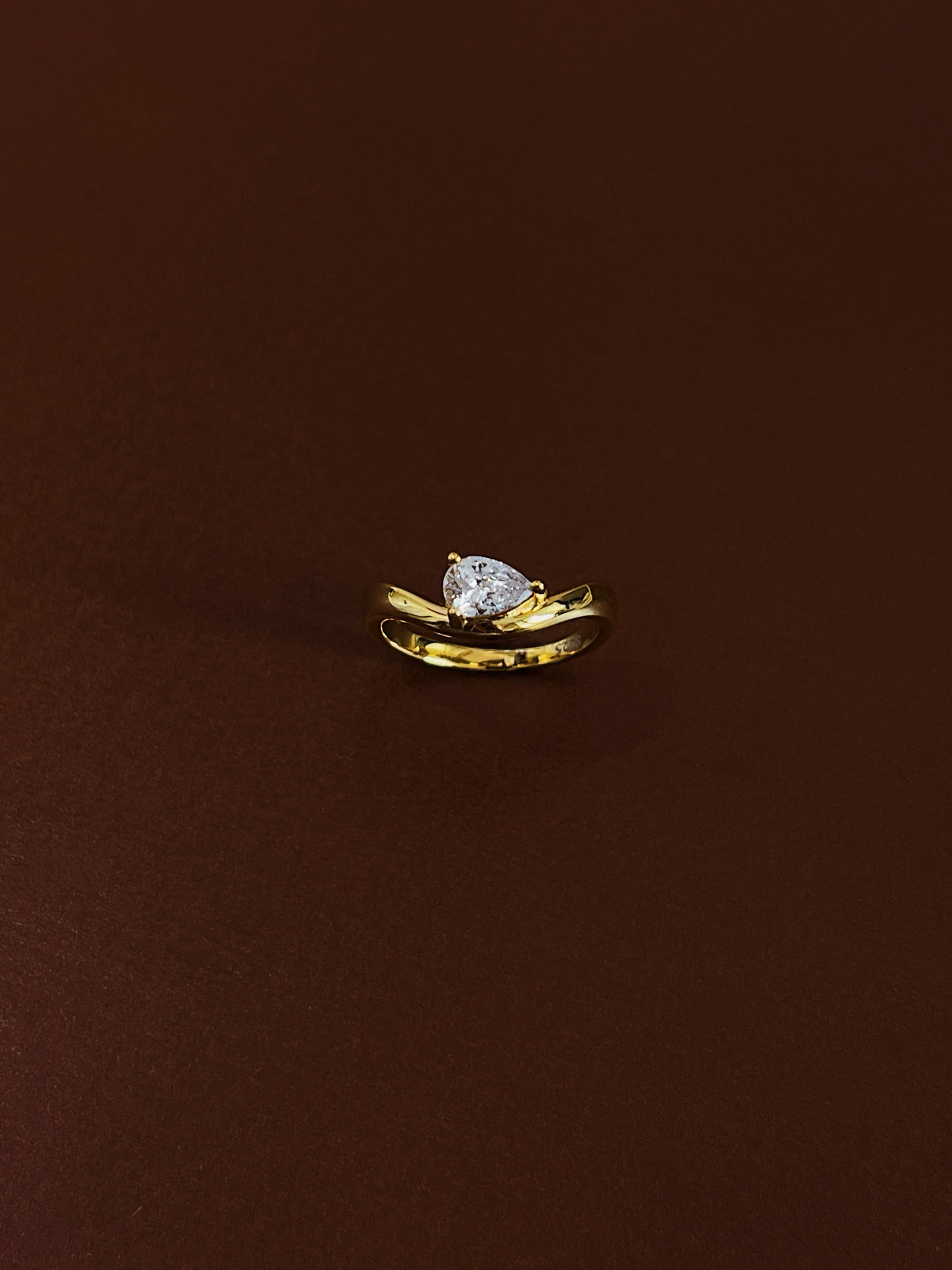 18k gold vermeil on sterling silver nova pear solitaire wave pinky ring studio shot