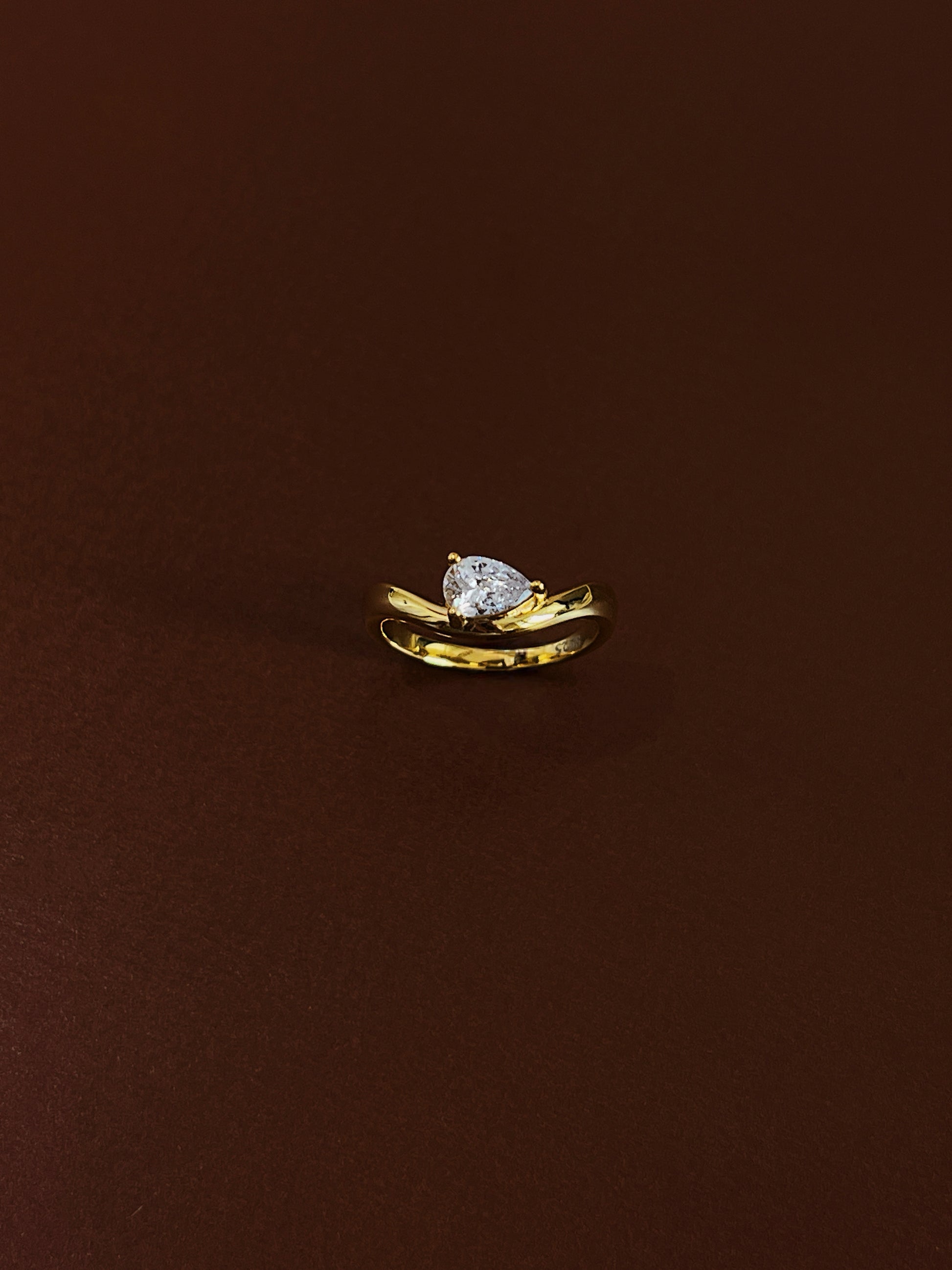 18k gold vermeil on sterling silver nova pear solitaire wave pinky ring studio shot