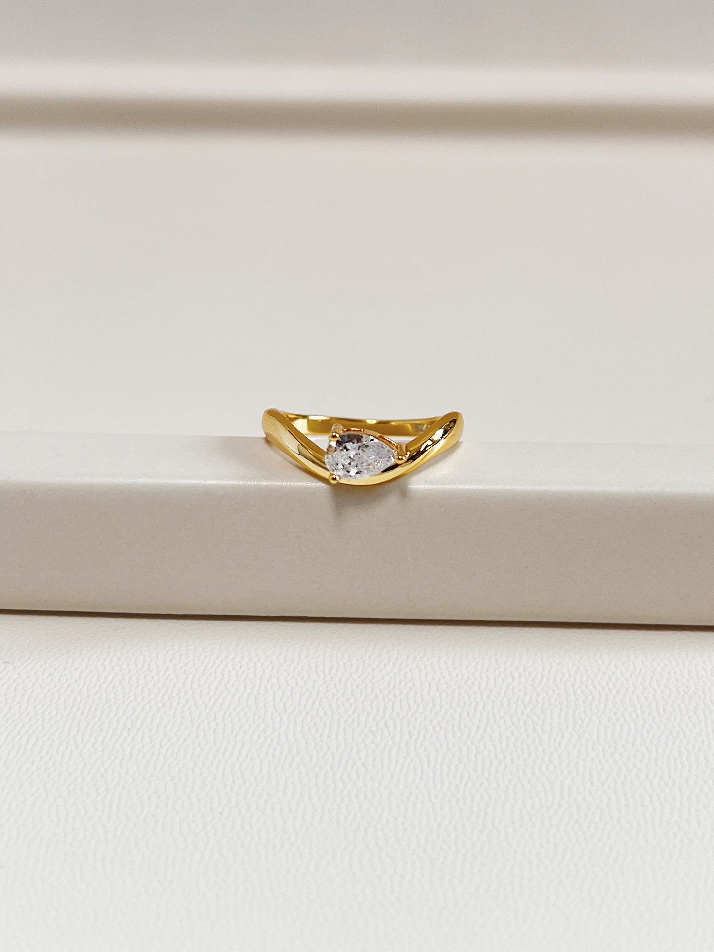 macro sparkle detail of pear shaped moissanite stone