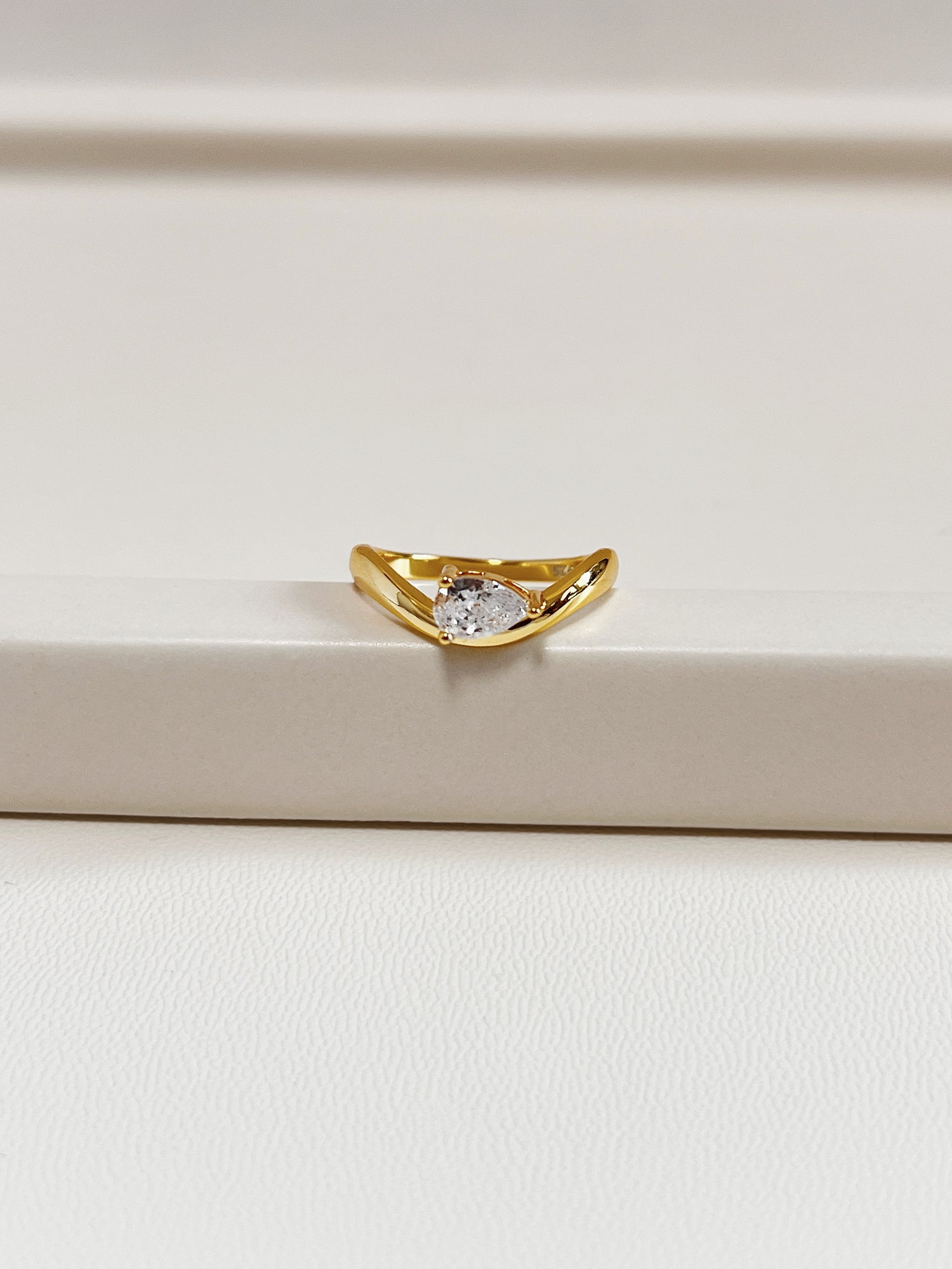 macro sparkle detail of pear shaped moissanite stone