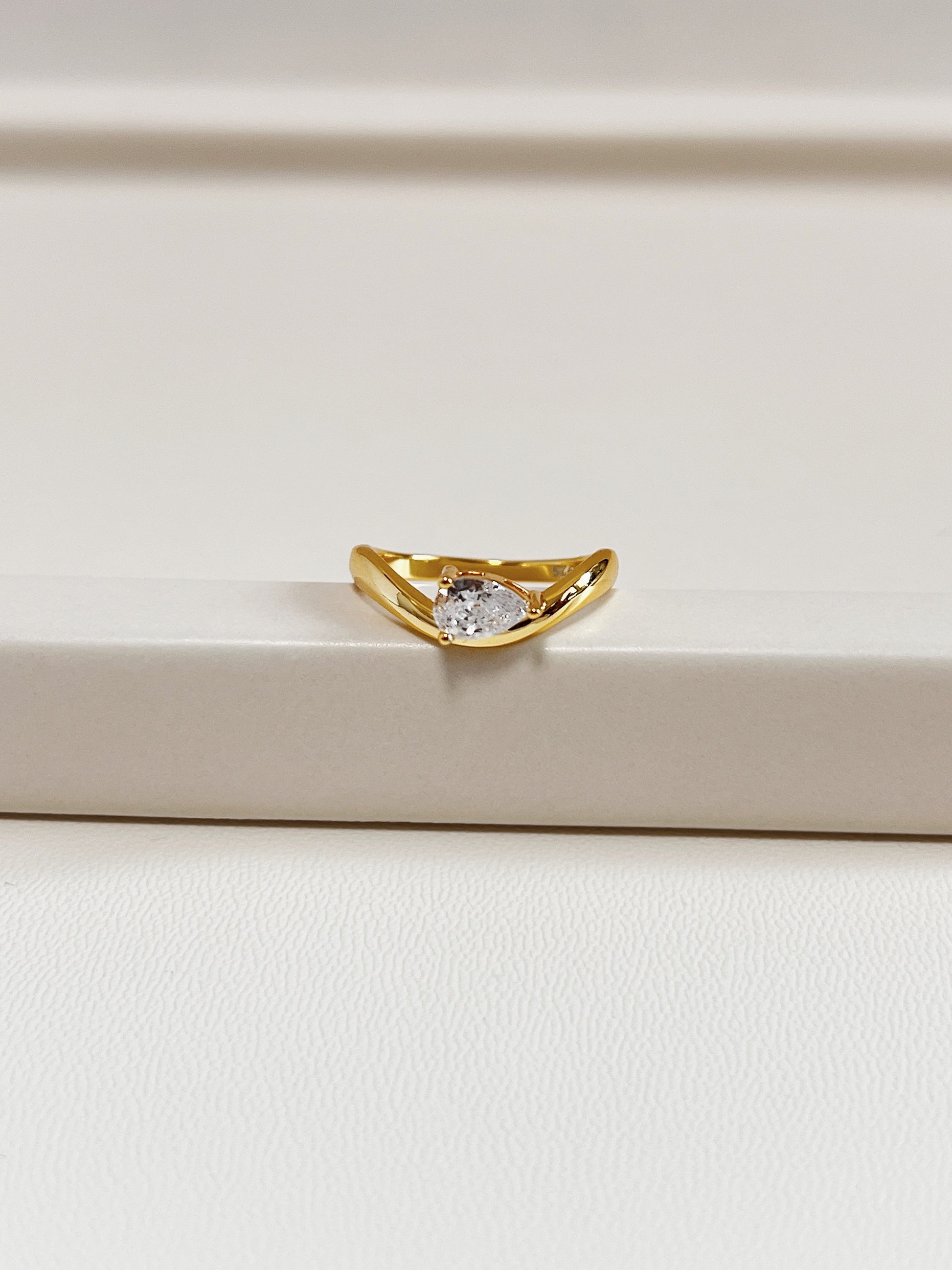 macro sparkle detail of pear shaped moissanite stone