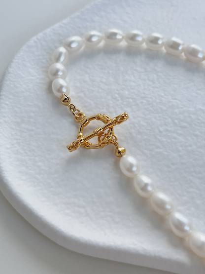 Close up macro shot of radiant baroque freshwater pearls on an 18k gold PVD tarnish resistant closure