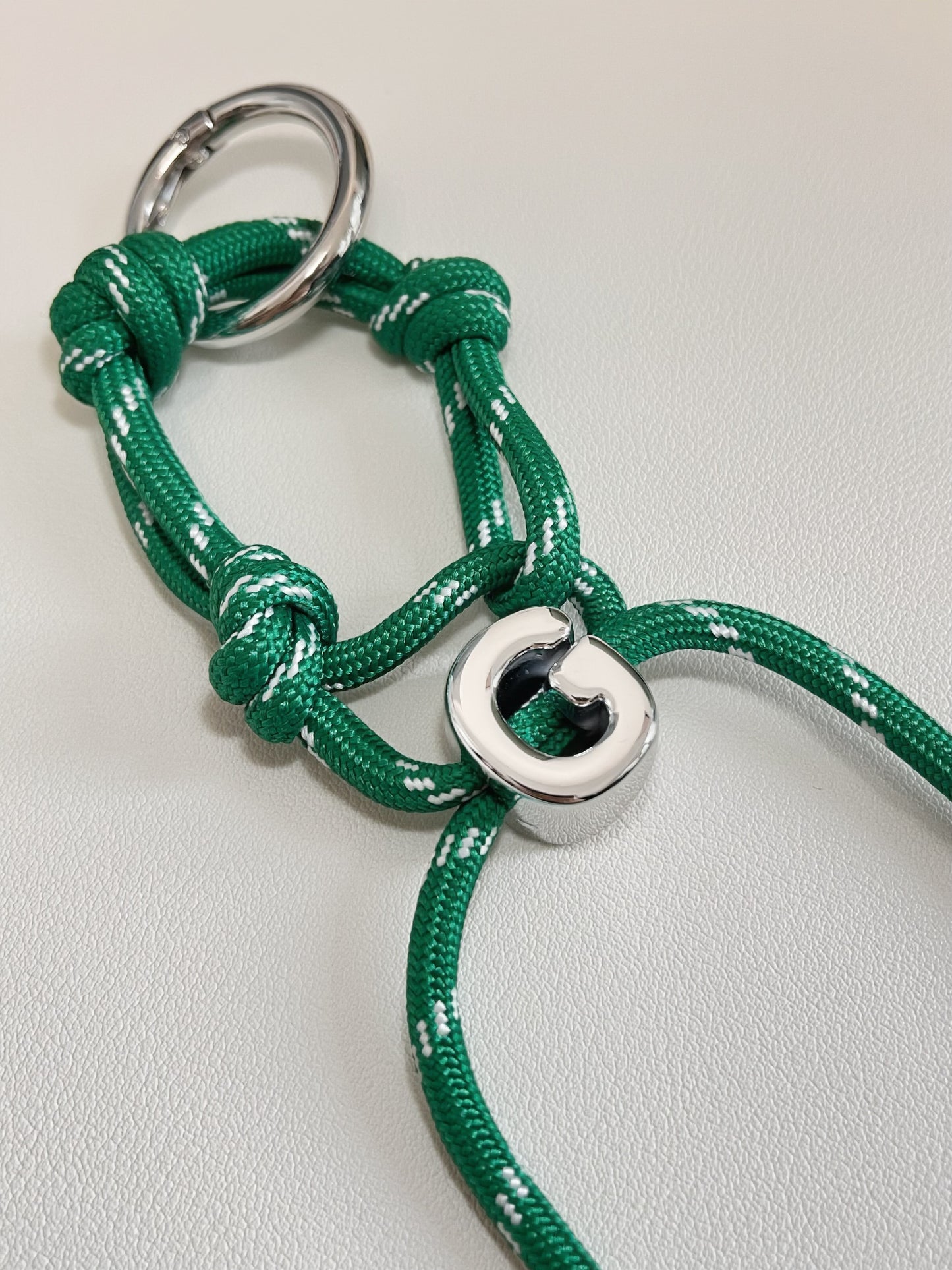 Close up perspective of tactical marine knotting on a premium paracord utility bag charm