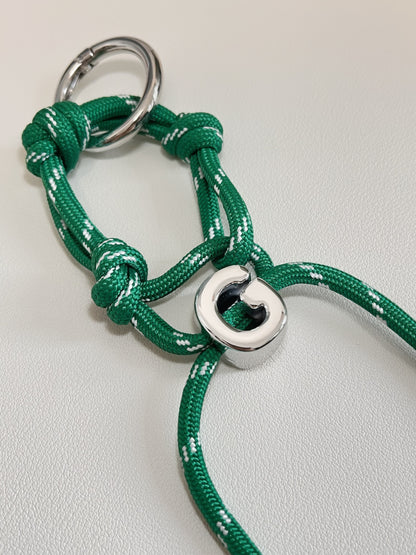 Close up perspective of tactical marine knotting on a premium paracord utility bag charm