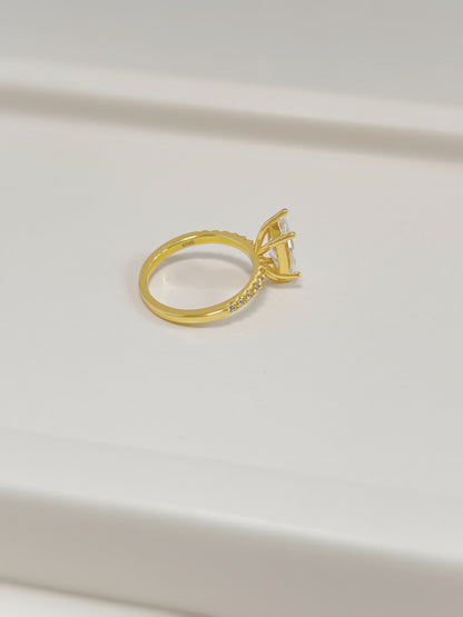 Side profile of 2-carat marquise moissanite setting on 18k gold vermeil band.