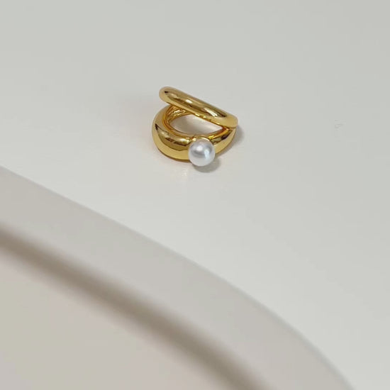 Gold ear cuff earring with a pearl