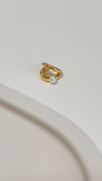 Gold ear cuff earring with a pearl