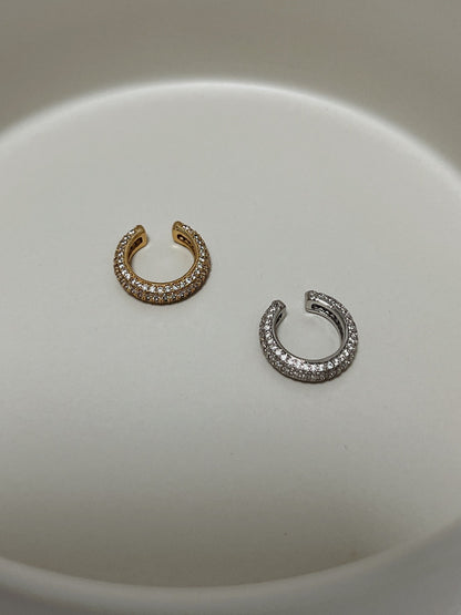 Stylish gold and silver ear cuff earrings with dazzling crystal accents
