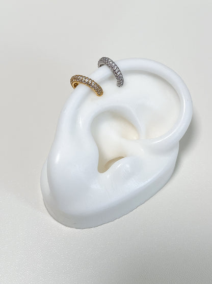 Close-up of a white's fake ear showing the Rose Pavé Cuff