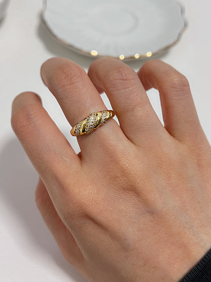 Detailed view of the thick dome band on the Claudia pavé ring.