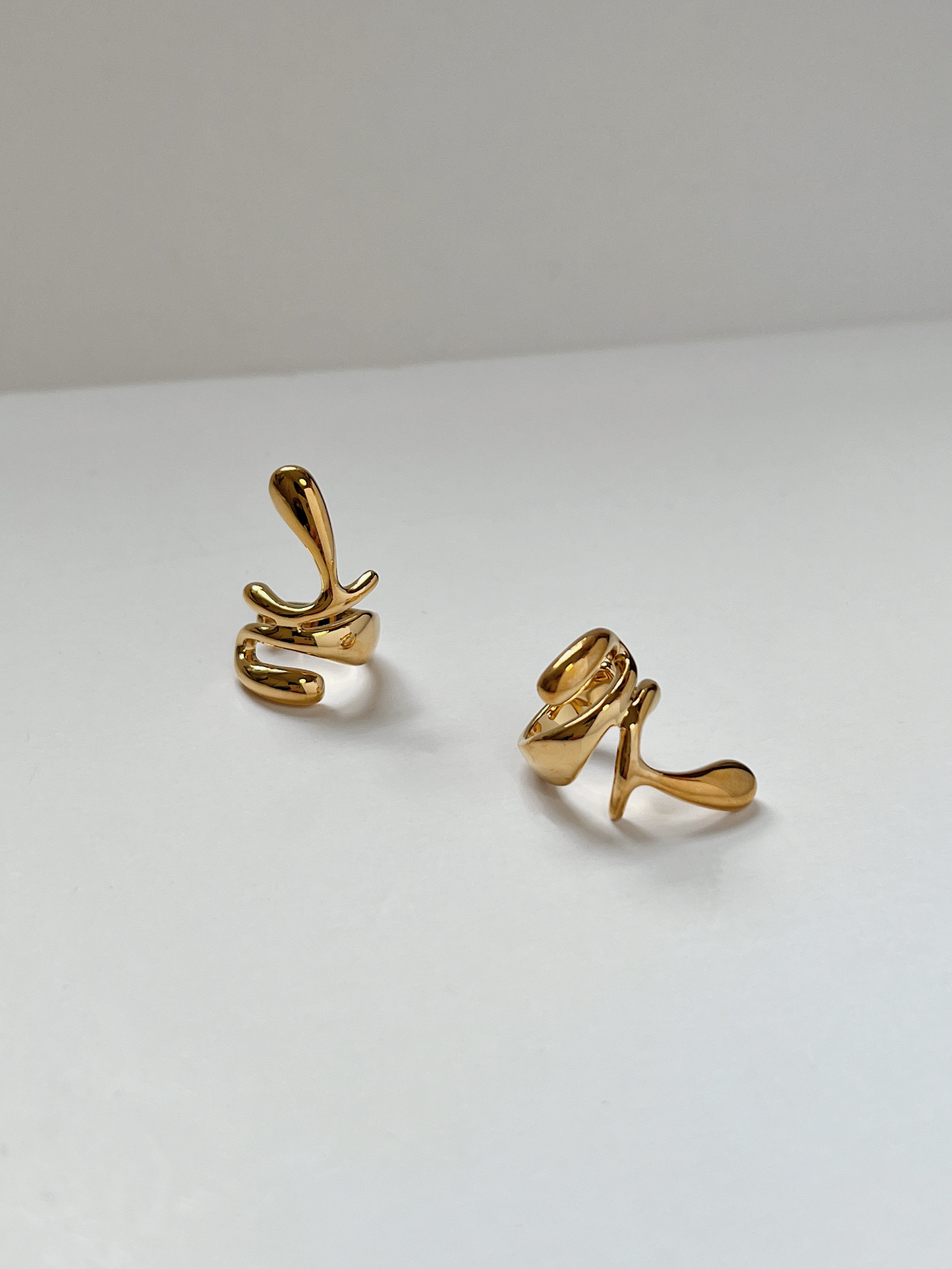 Detail view of the architectural sculptural design of the Dylan gold cuff.