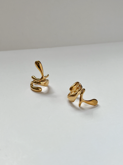 Detail view of the architectural sculptural design of the Dylan gold cuff.