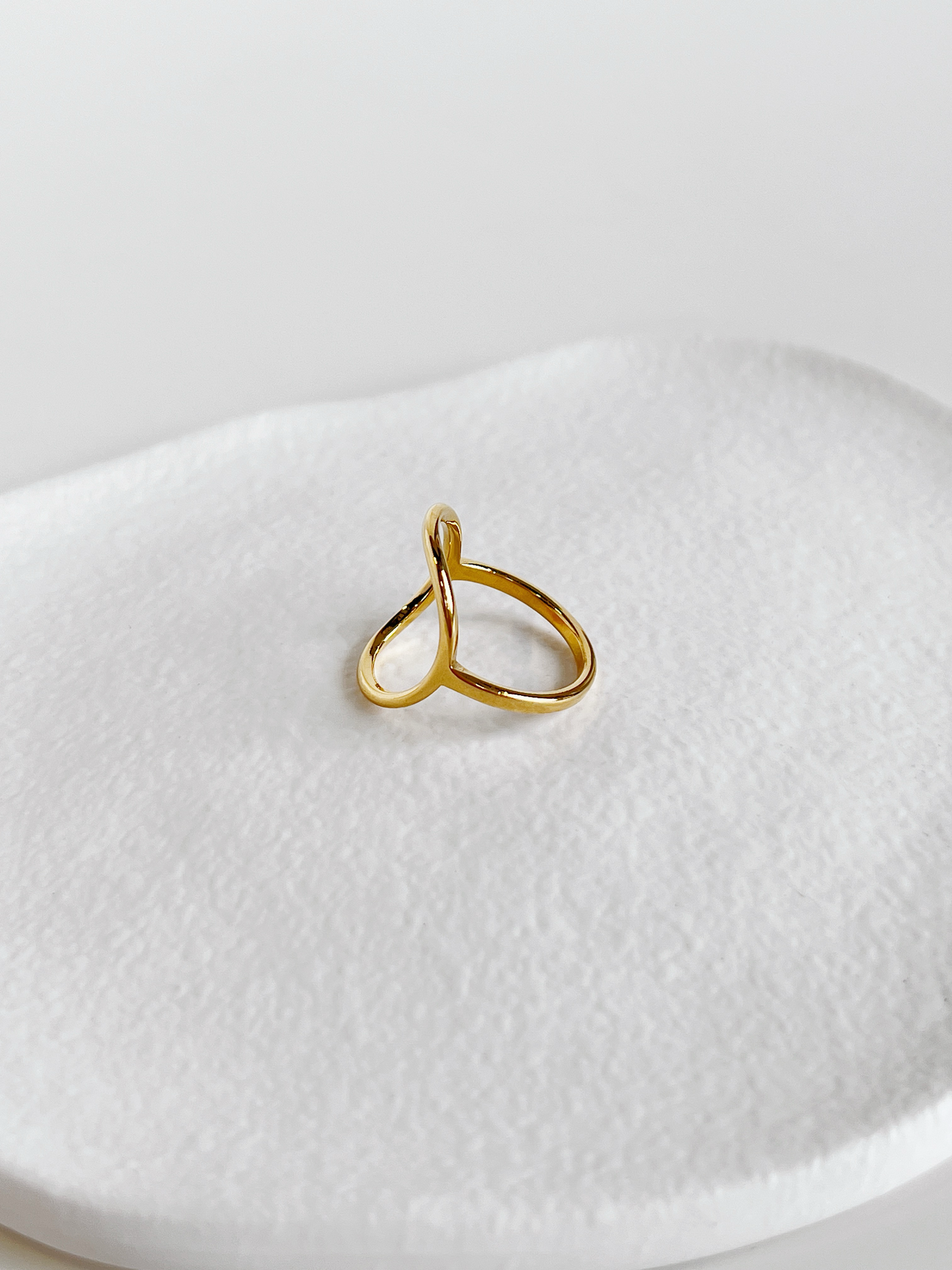 Low-profile delicate gold ring crafted with a solid jewelry-grade core