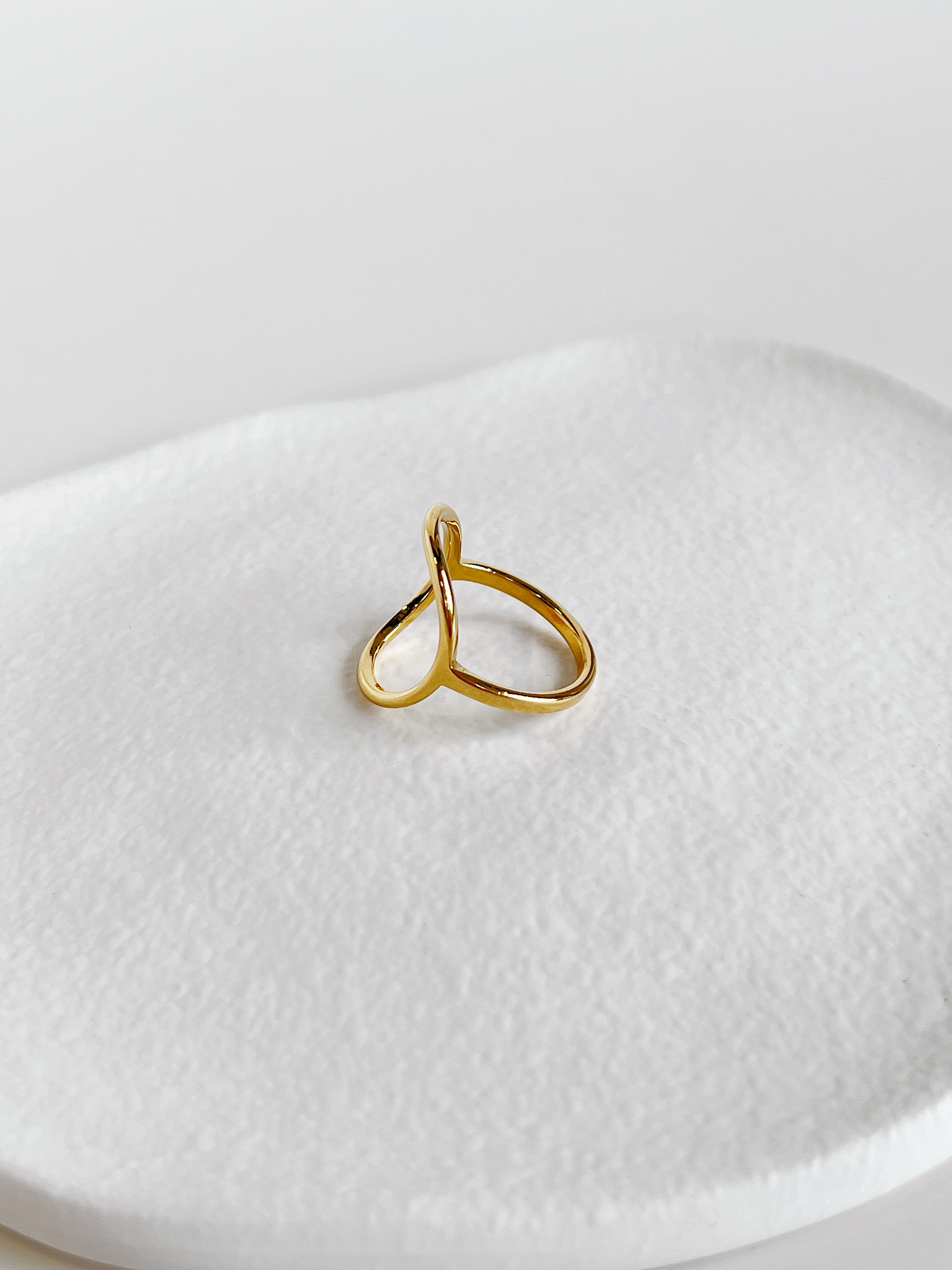 Low-profile delicate gold ring crafted with a solid jewelry-grade core
