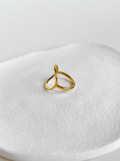 Low-profile delicate gold ring crafted with a solid jewelry-grade core