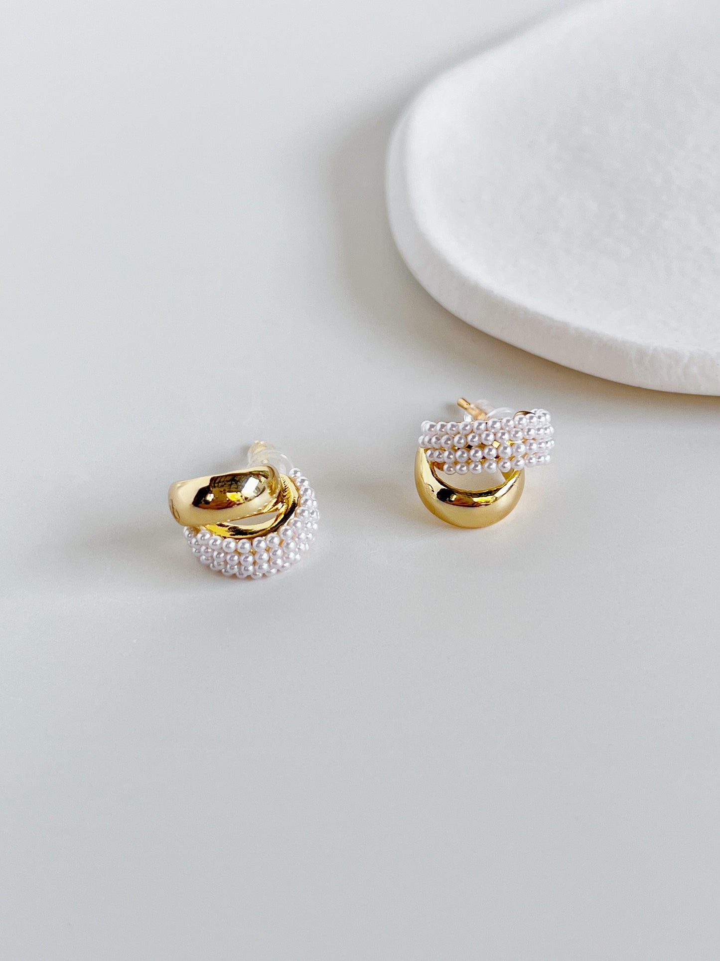 Front view of hypoallergenic solid brass core double hoop illusion stud earrings