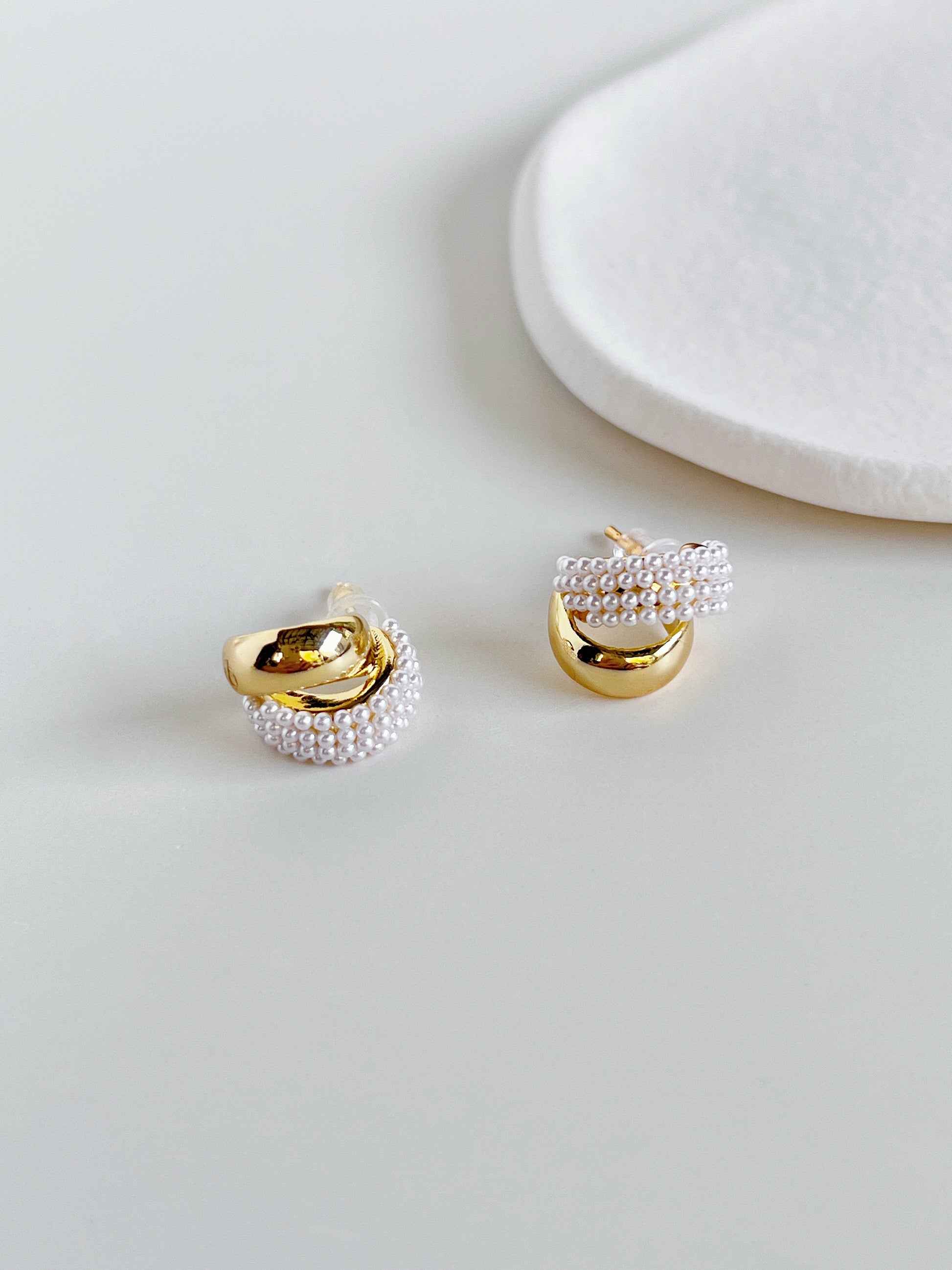Front view of hypoallergenic solid brass core double hoop illusion stud earrings