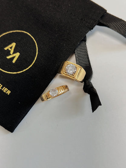 Radiant light reflecting off the high-polish gold PVD stainless steel.