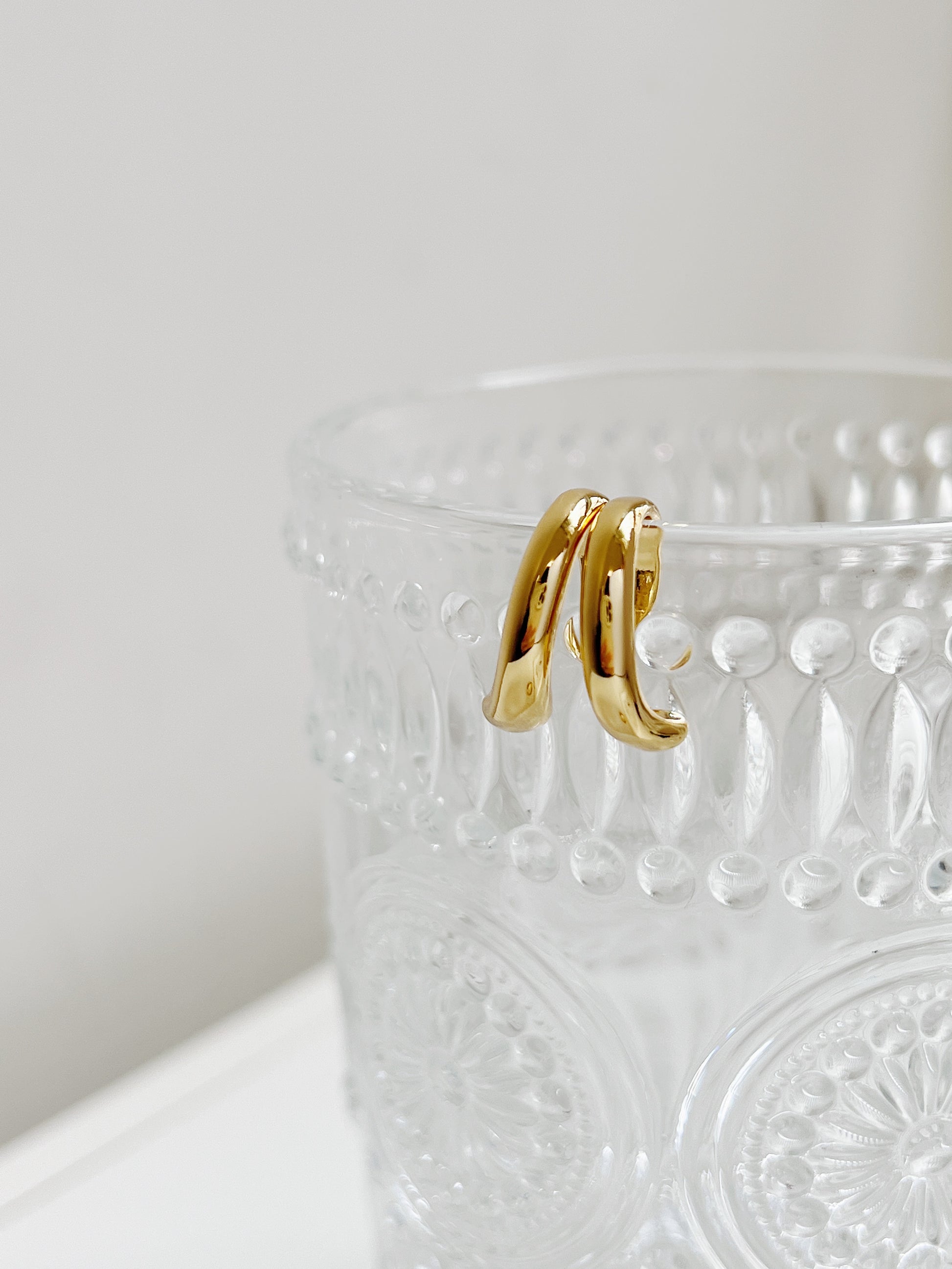 Front view of Tobi ear cuff, natural lighting.