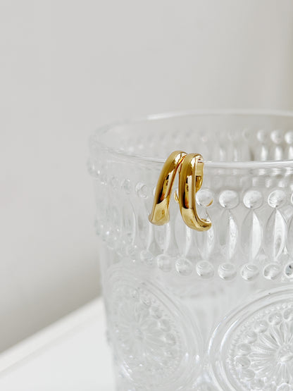 Front view of Tobi ear cuff, natural lighting.
