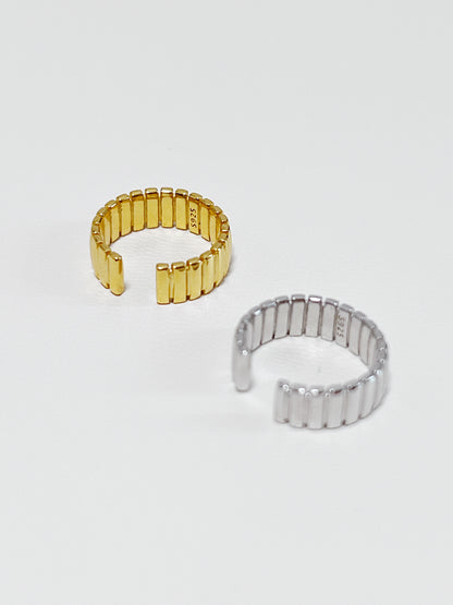 Kate ear cuff in gold and silver with hallmark reading S925