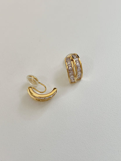 Close up view of transparent silicone comfort pad on wire clip fastening of Tiana non-pierced earring