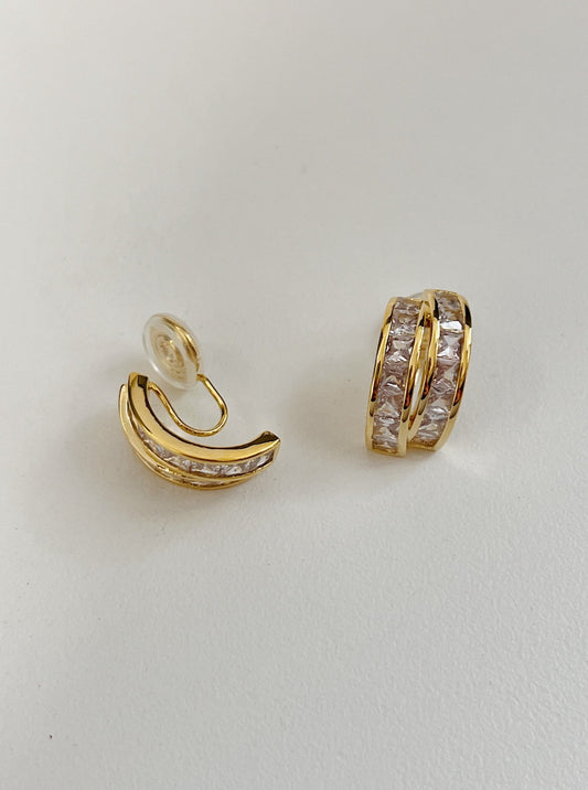 Pair of Tiana 15mm gold clip-on earrings featuring channel-set princess-cut cubic zirconia