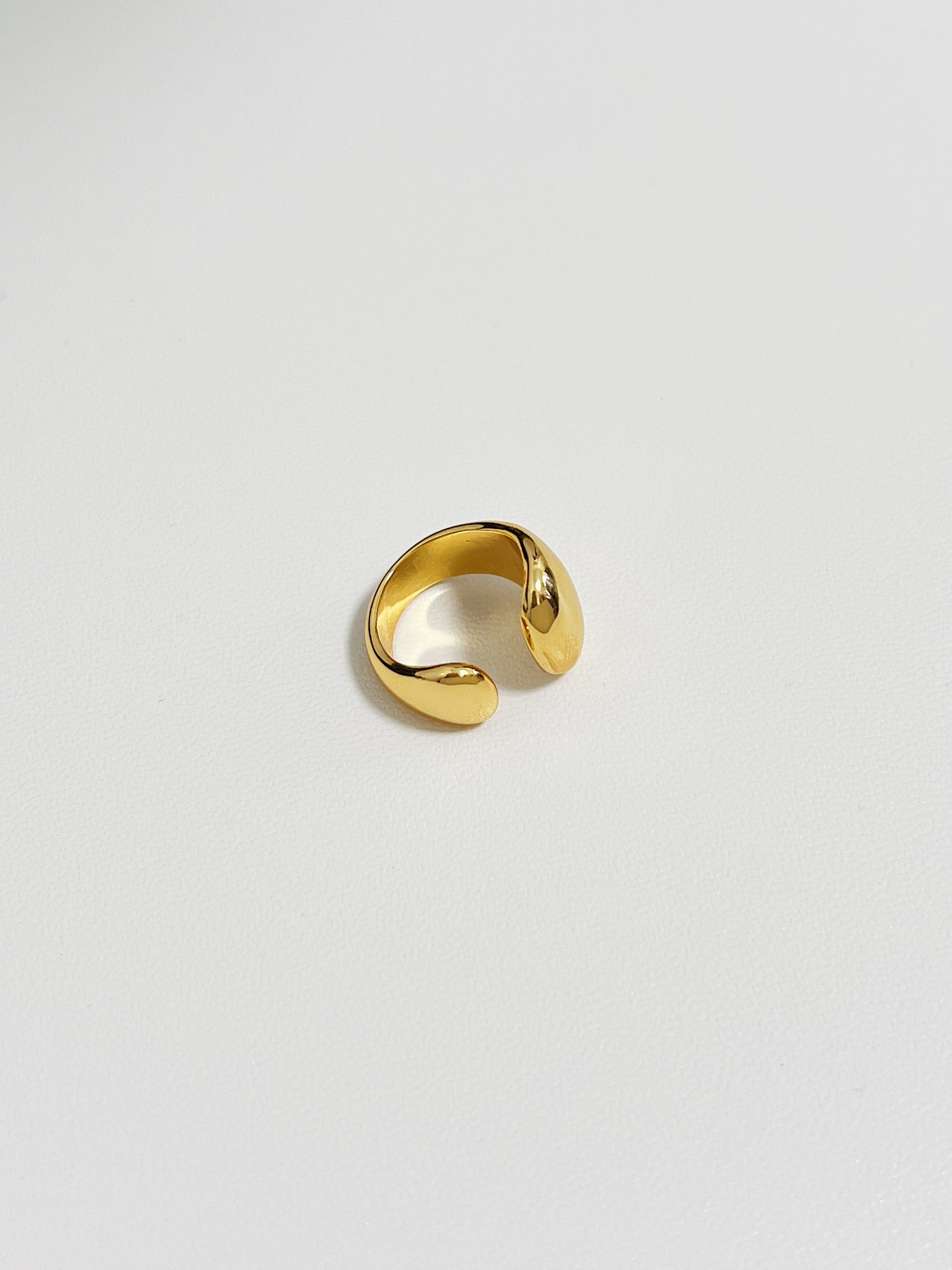 Side profile of Tobi organic flow ear cuff.