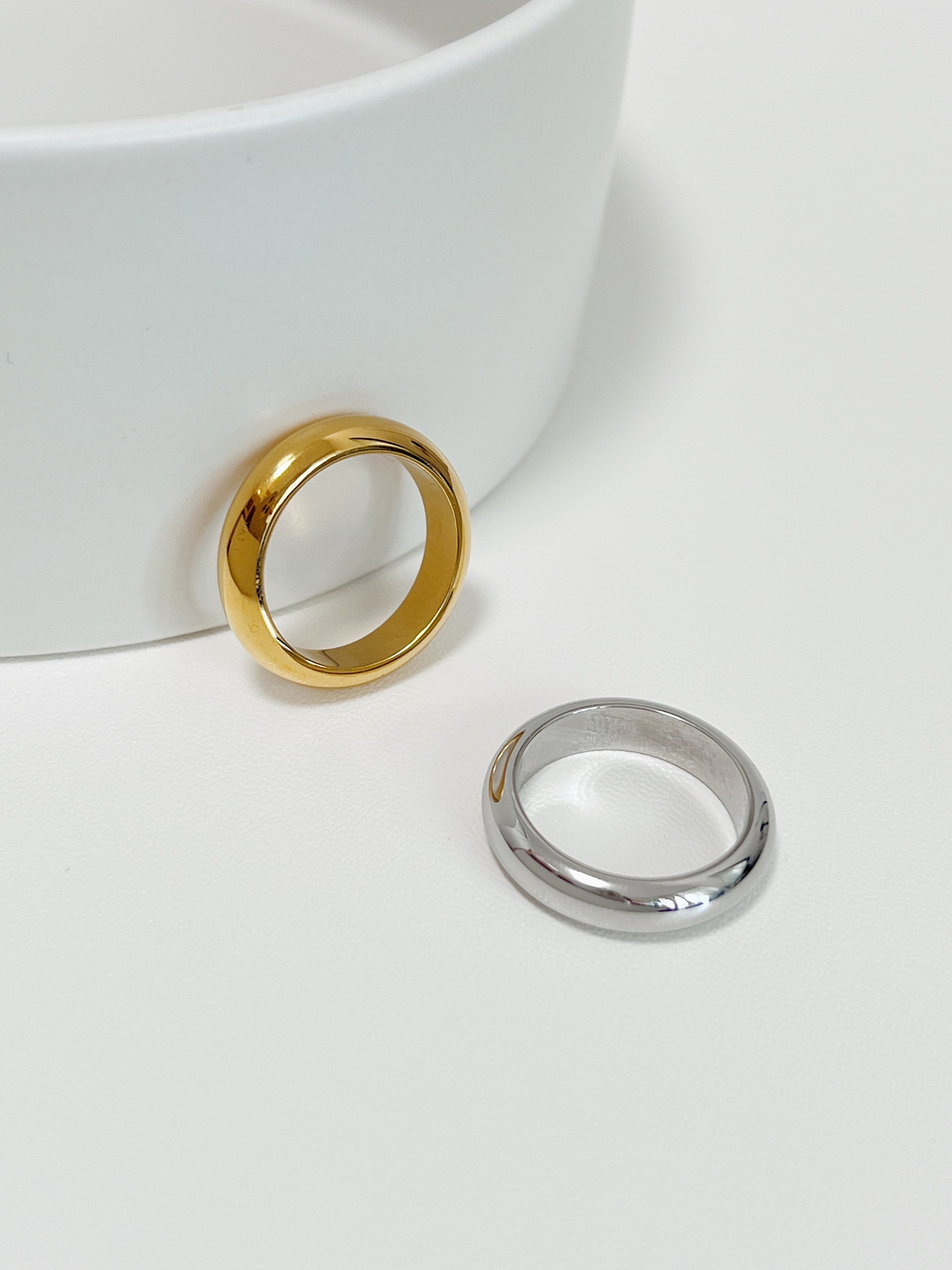 Dainty gold and silver rings for women featuring a fixed profile