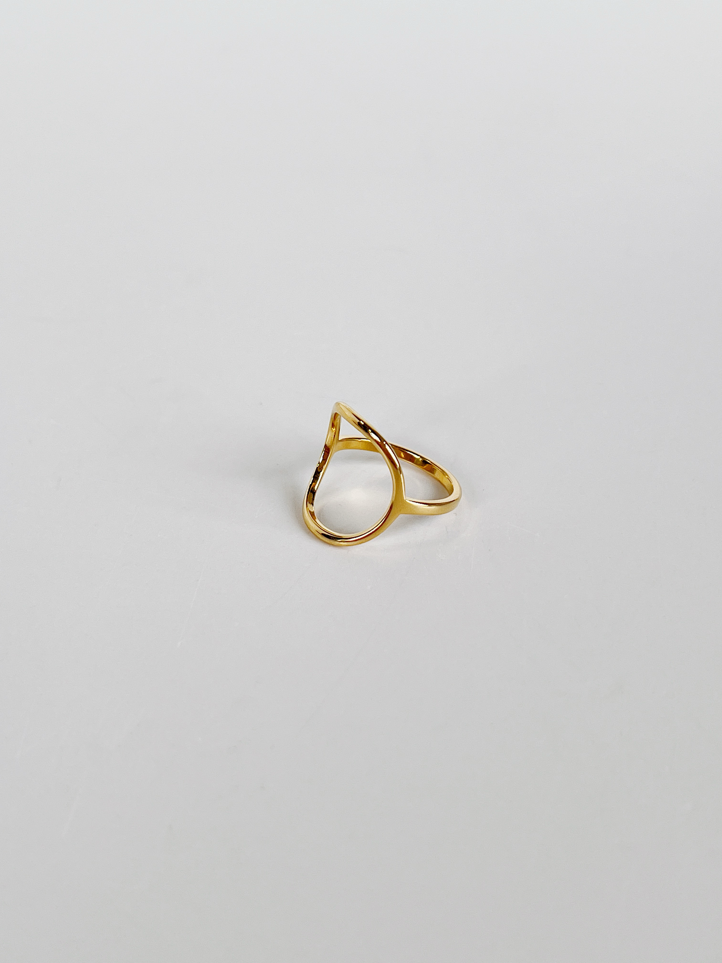Dainty gold rings for women highlighting the non-adjustable fixed profile