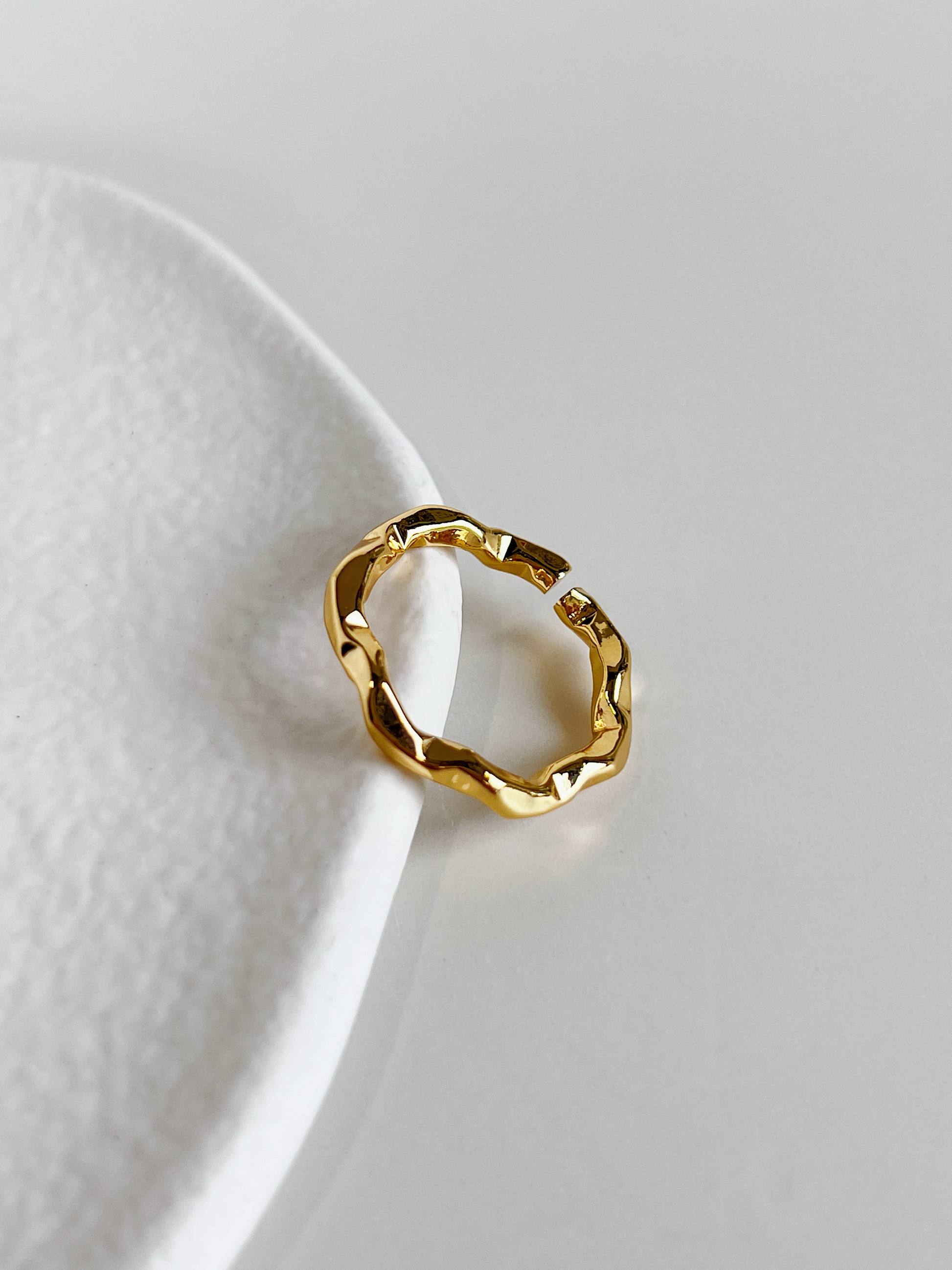 Delicate gold rings for women highlighting the smooth low profile
