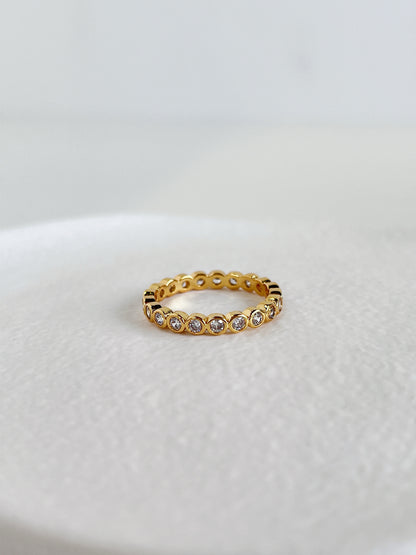 Waterproof non tarnishing gold bezel ring by Aurous Atelier