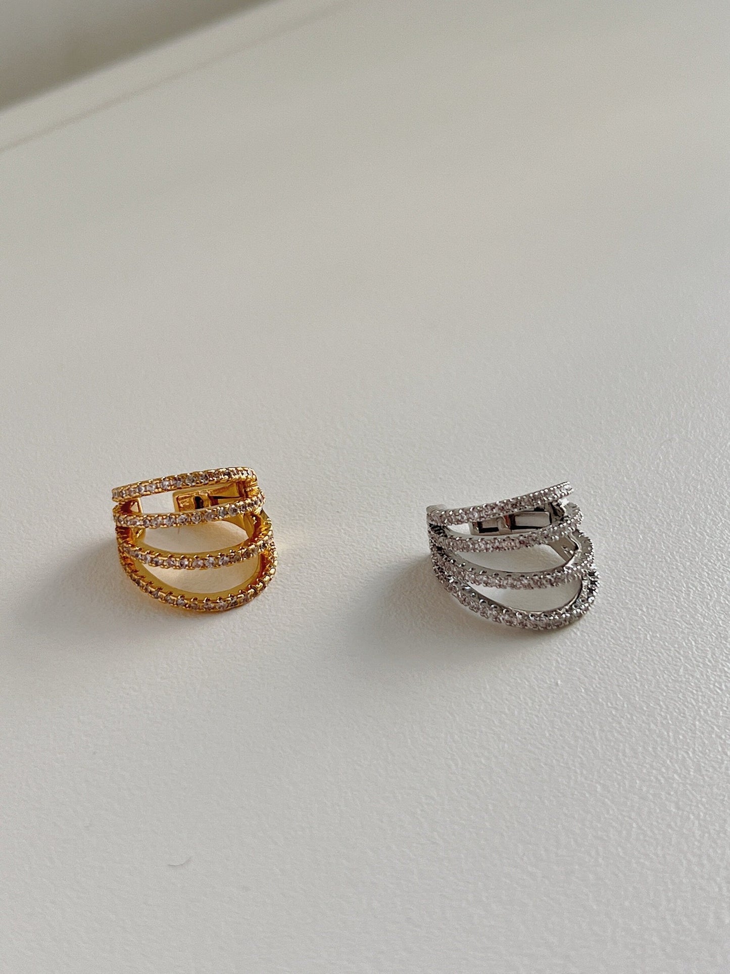 Front view of Aurelia gold ear cuff natural lighting.